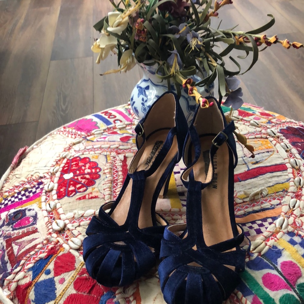 Navy blue, velvety pumps. Very stylish, retro, and very comfortable.